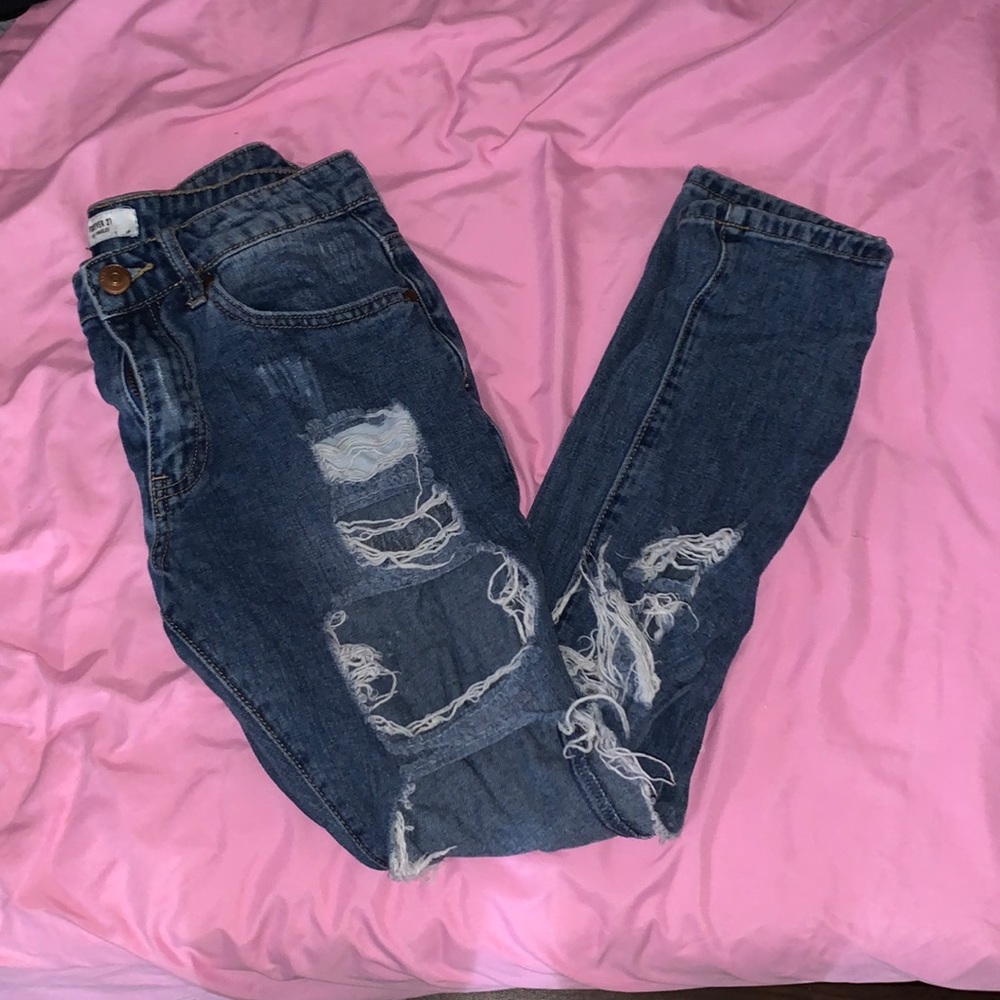 Low rise mega ripped jeans